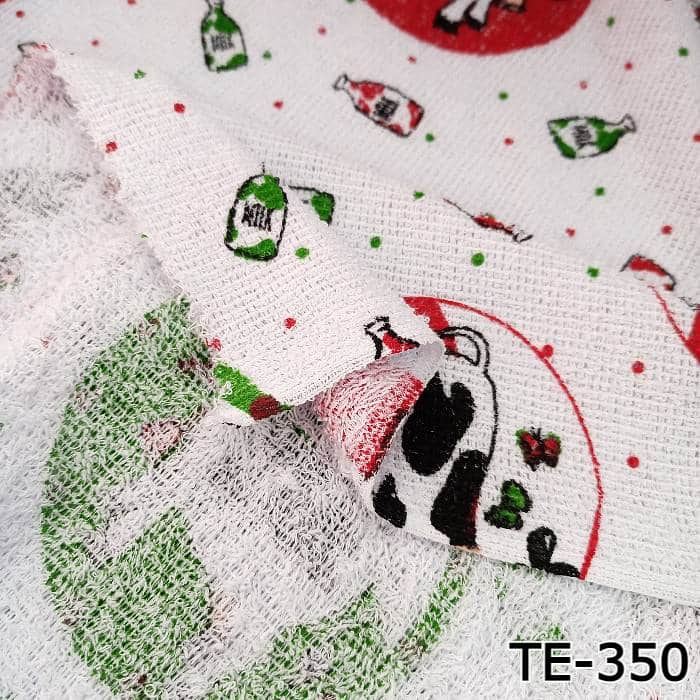 TOALLA-ESTAMPADA-CIRCULOS-CON-VACAS-Y-BOTELLAS-DE-LECHE-TE-350